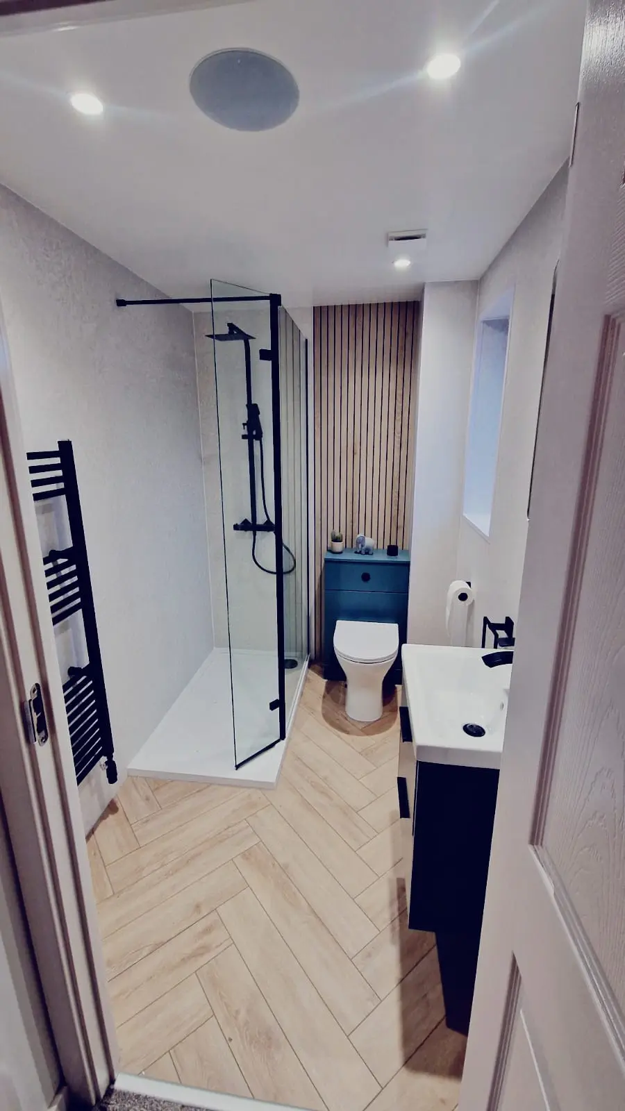 Herringbone LVT flooring in a fitted bathroom, Cumbernauld